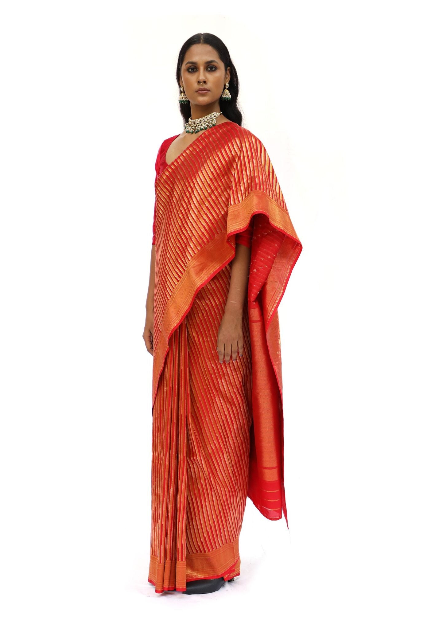 ADVAITA – tangy orange saree