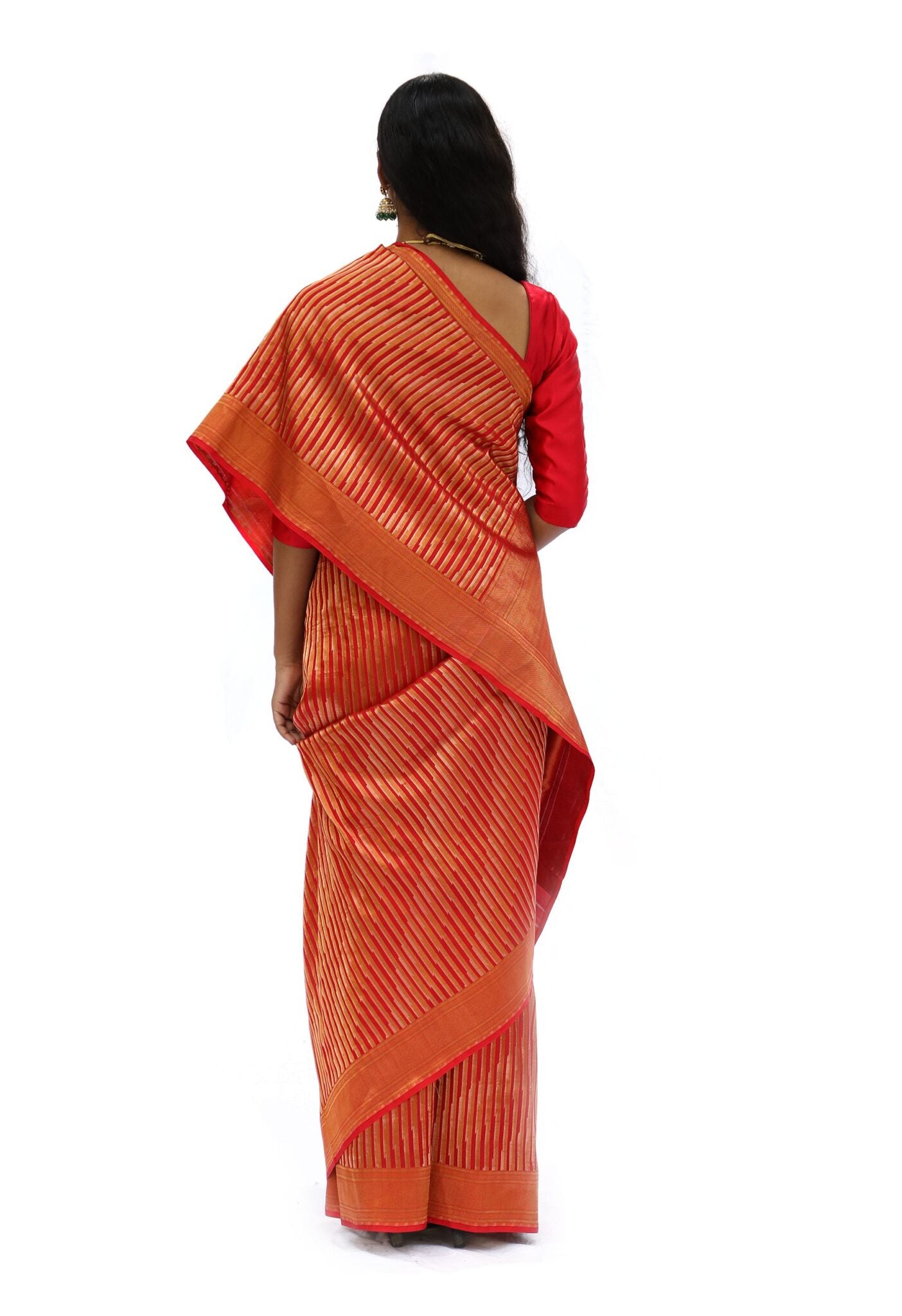 ADVAITA – tangy orange saree