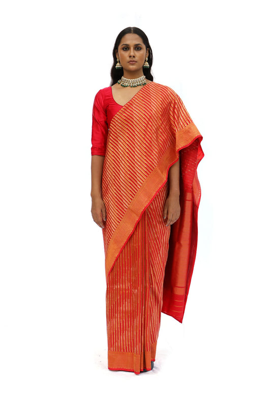 ADVAITA - tangy orange saree